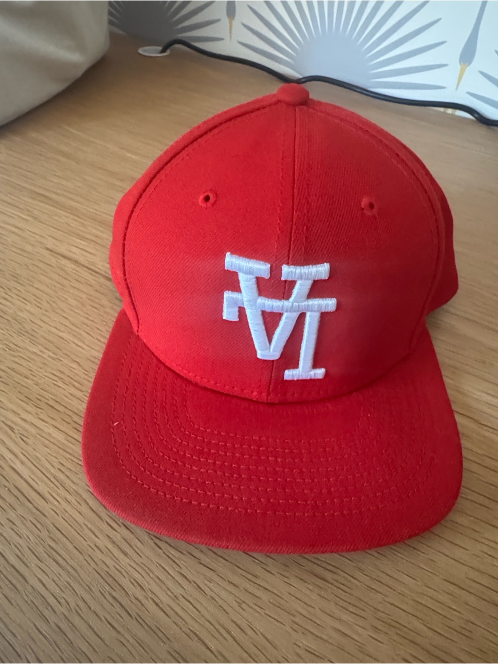 Red Baseball Cap with White Embroidered upside down LA Logo
